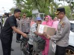 Polres Langsa-Bhayangkari Berbagi Takjil dan Paket Sembako