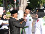 Pj Walikota Sabang Kukuhkan Anggota Paskibra HUT RI ke 79