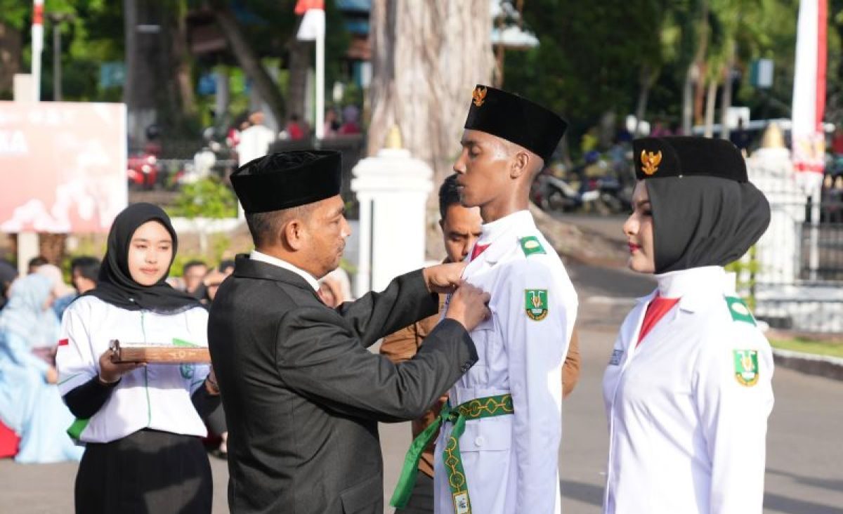 Pj Walikota Sabang Kukuhkan Anggota Paskibra HUT RI ke 79